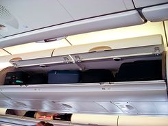 Hand luggage compartments/ prostor za shranjevanje ročne prtljage  na  Airbus 340-600 aircraft (economy class)